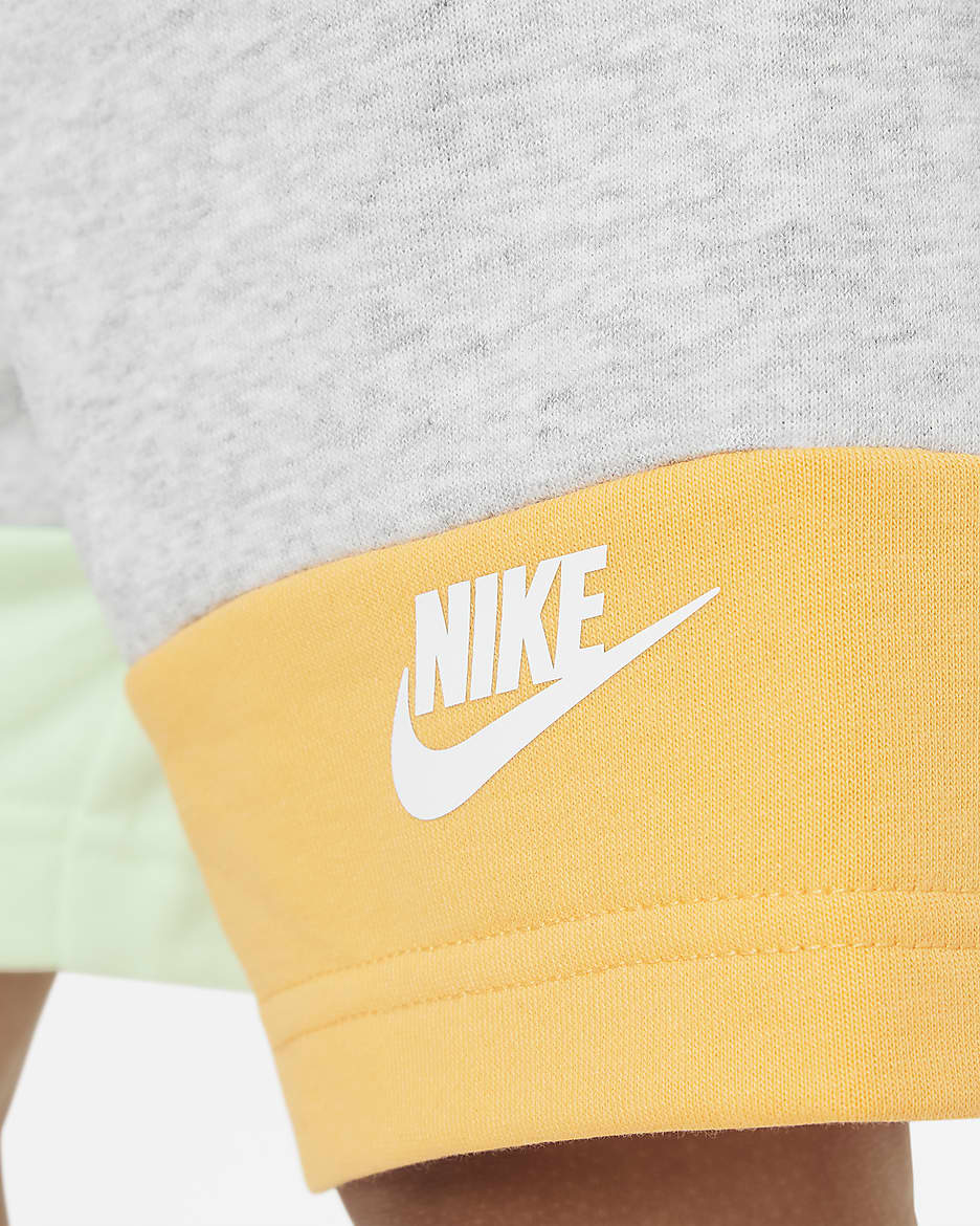 Nike large swoosh shorts yellow online